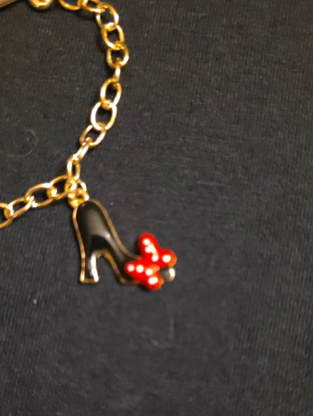 Gold-Tone Charm Bracelet with Red Enamel Accents